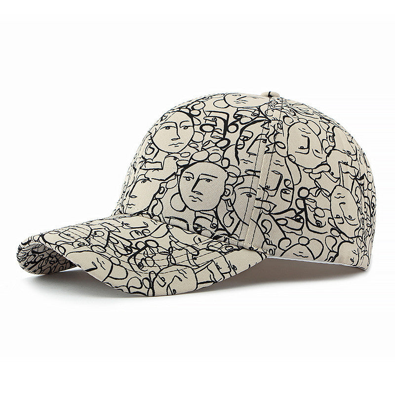 Beige retro peaked cap with black face graffiti line pattern and curved brim