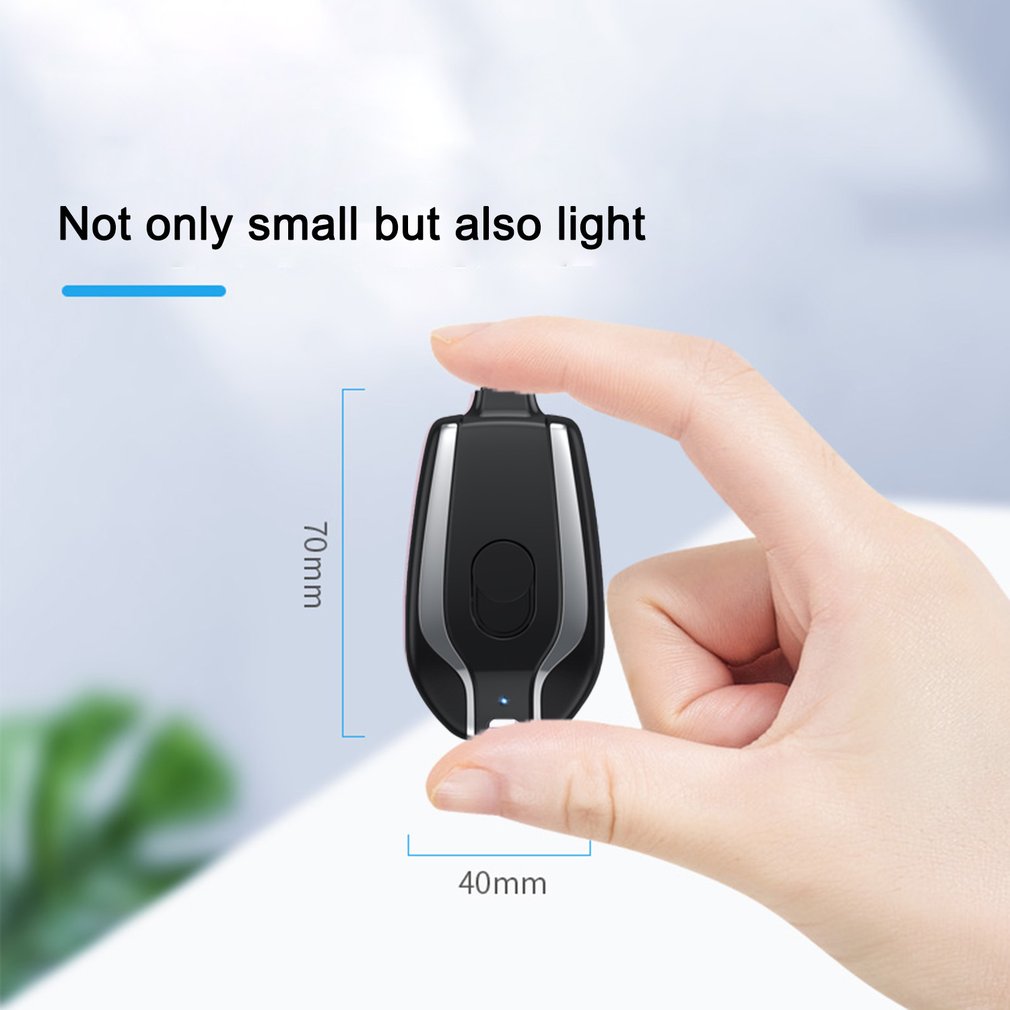 Black mini keychain power bank pod charger with orange side stripe and chain