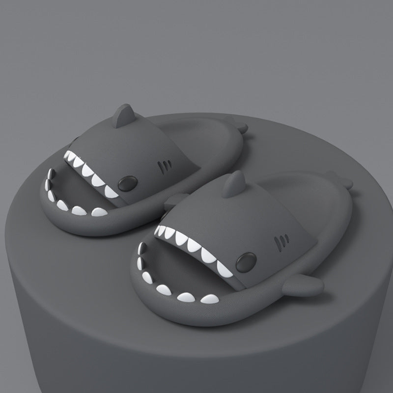 Cartoon shark slippers, dark gray slide-on sandals with white teeth and small fin details