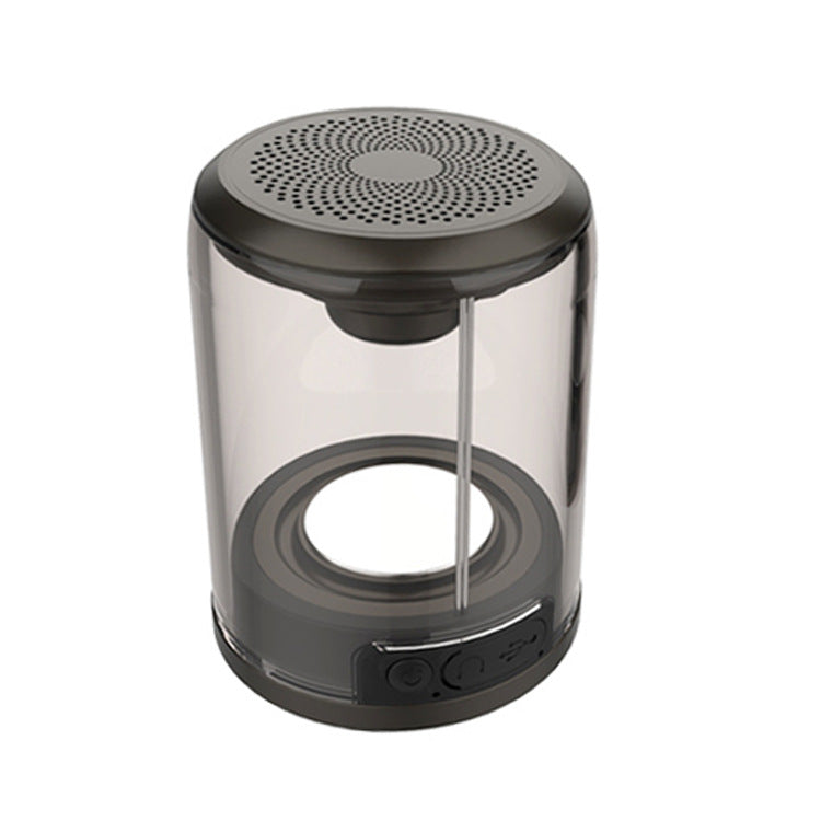 Bluetooth speaker with transparent cylinder body, light top grille, and black bottom controls