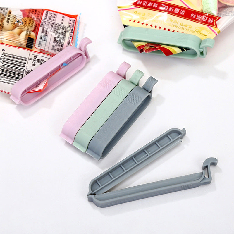 Plastic bag sealing clips set, light pink, mint, and gray clips with clasp
