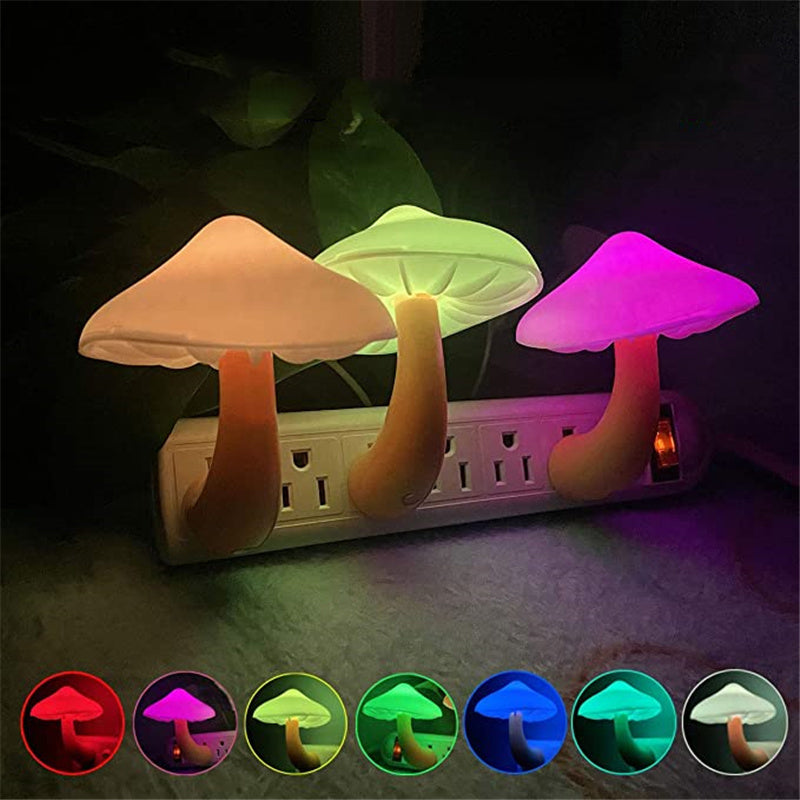 Plug-in mushroom LED night light set with glowing caps in multiple colors on outlet